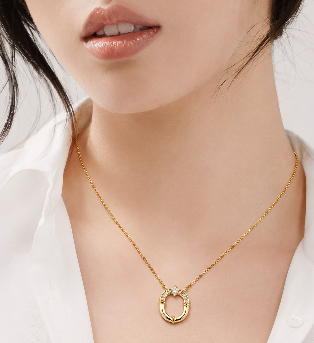 Relic Oval Halo Necklace in gold tone, model styling view