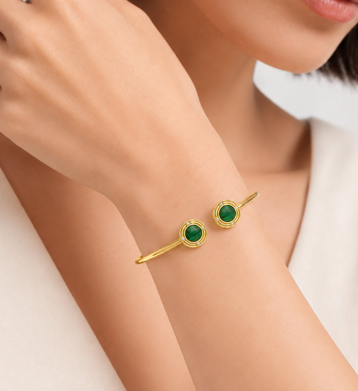 Relic Medallion Bangle (Green Stone Effect)
