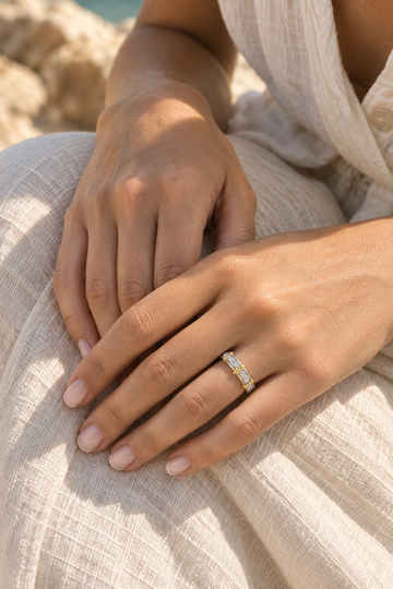 AMBECA Relic Arc Ring editorial concept worn on hands in warm sunlight