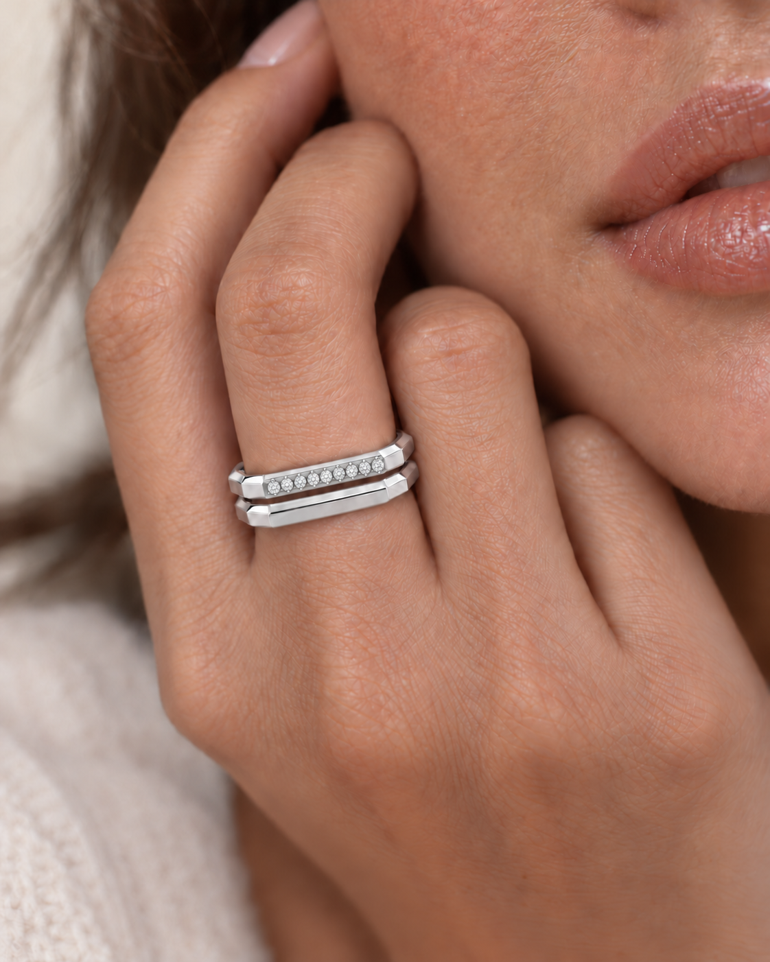 AMBECA silver-tone Mosaic pave and plain stacking rings worn together on a model's hand, styling view