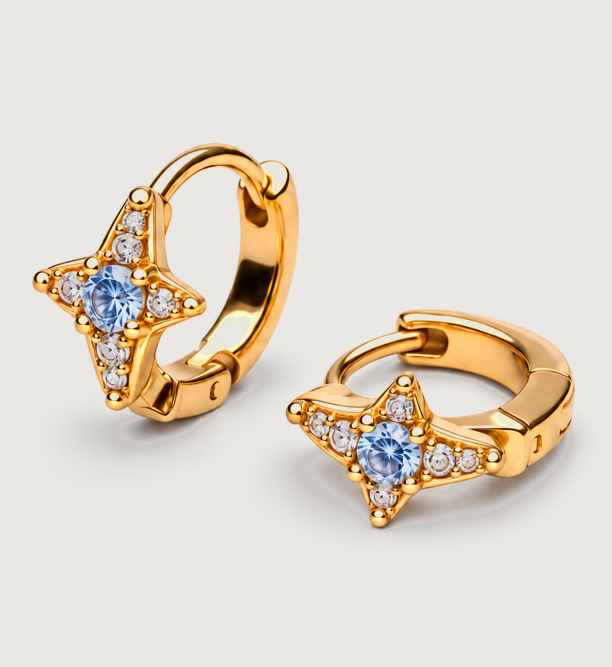 Aurelle Blue Star Huggie Earrings (Gold), front product view