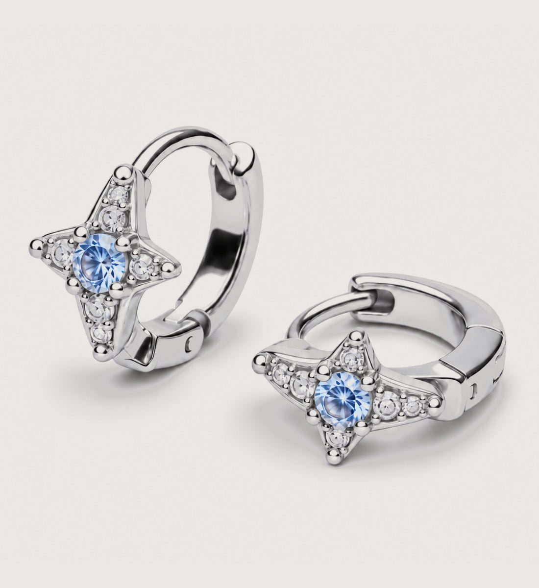 Aurelle Blue Star Huggie Earrings (Silver), front product view