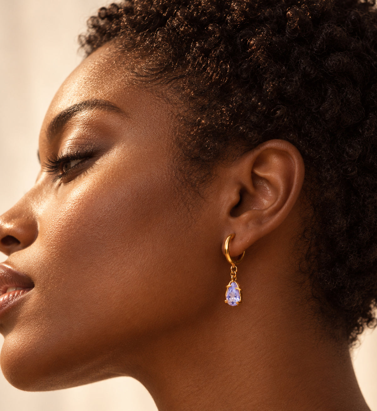 Aveline Lilac Pear Star Huggie Earrings in Gold, model styling view 3