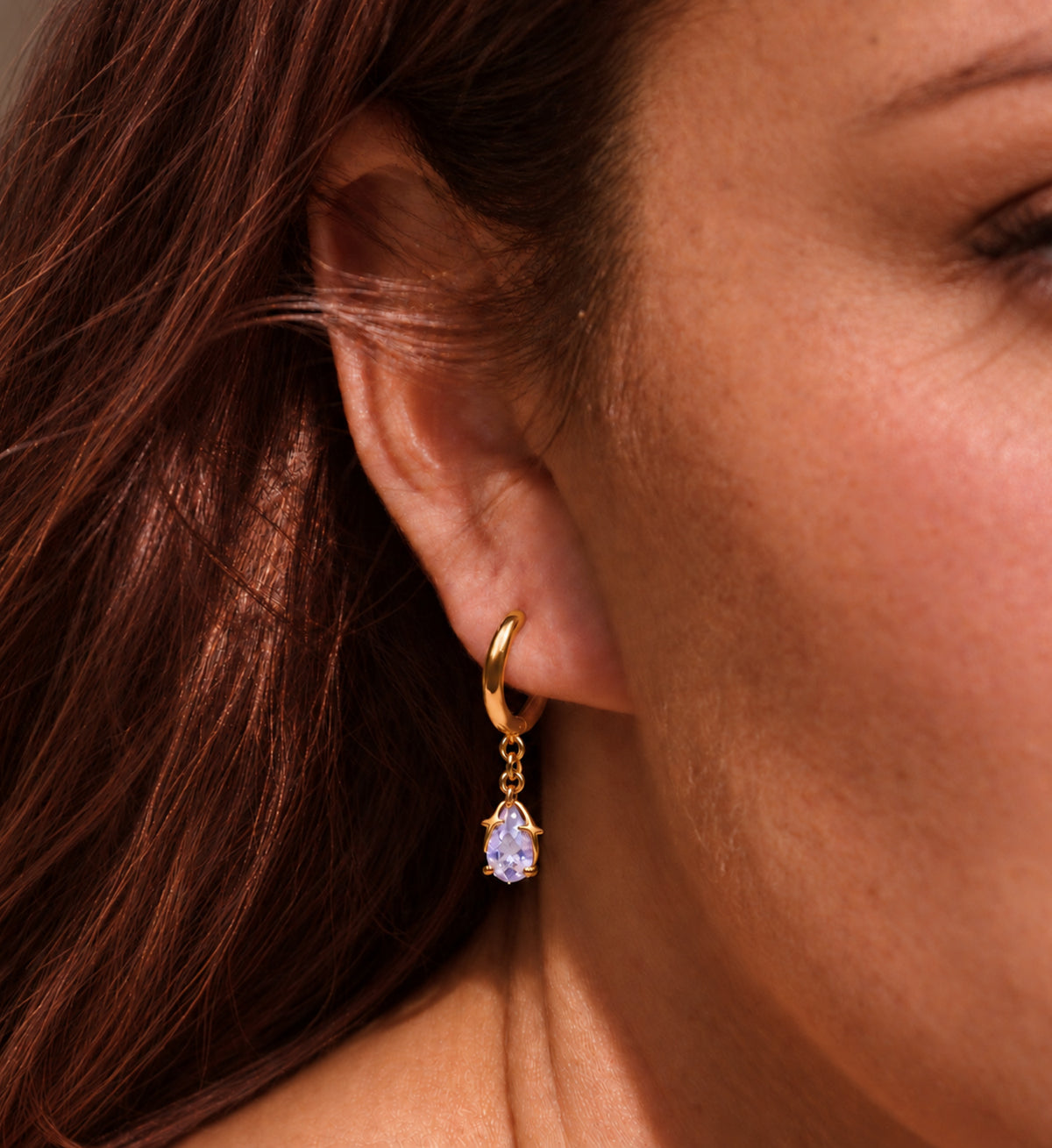Aveline Lilac Pear Star Huggie Earrings in Gold, model styling view 4