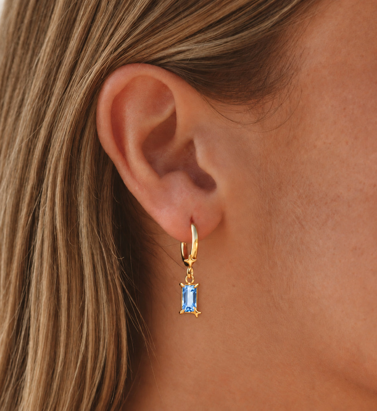 Caelum Blue Rectangle Star Drop Earrings in Gold, model styling view 2