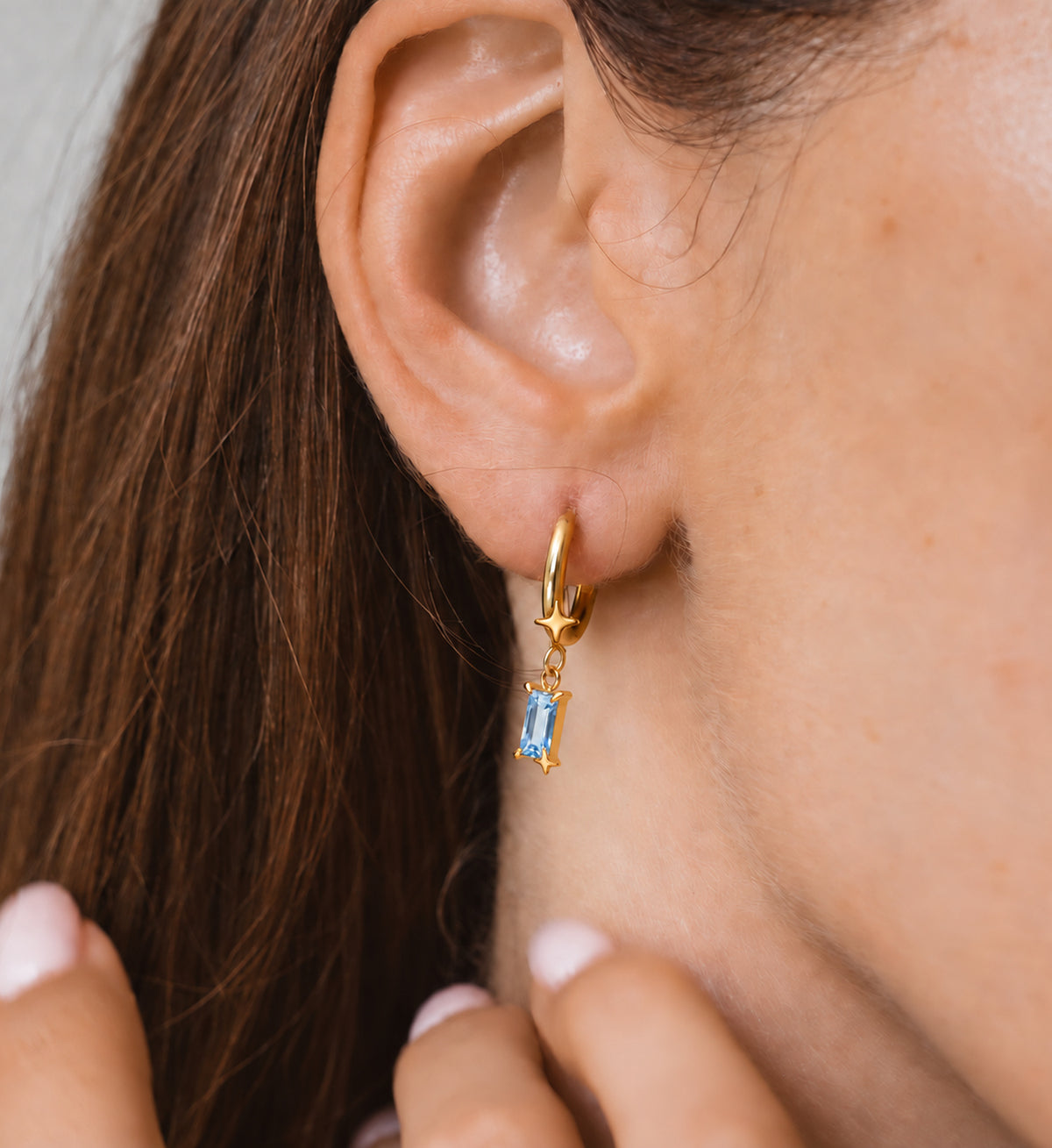 Caelum Blue Rectangle Star Drop Earrings in Gold, model styling view 5