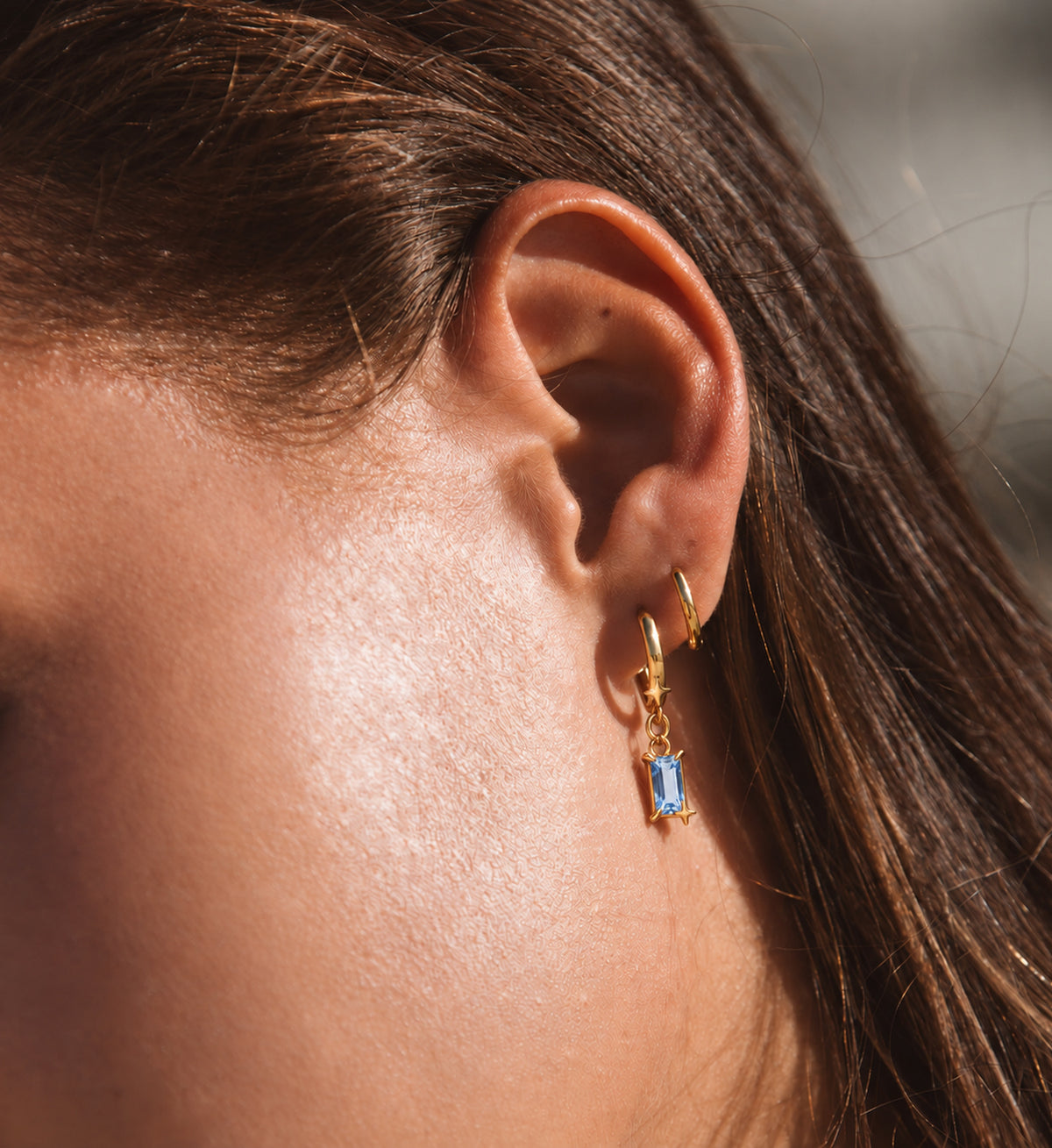 Caelum Blue Rectangle Star Drop Earrings in Gold, model styling view 6