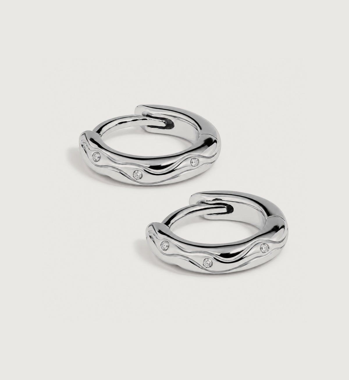 Marea Sculpted Wave Huggie Earrings (Silver), main product view