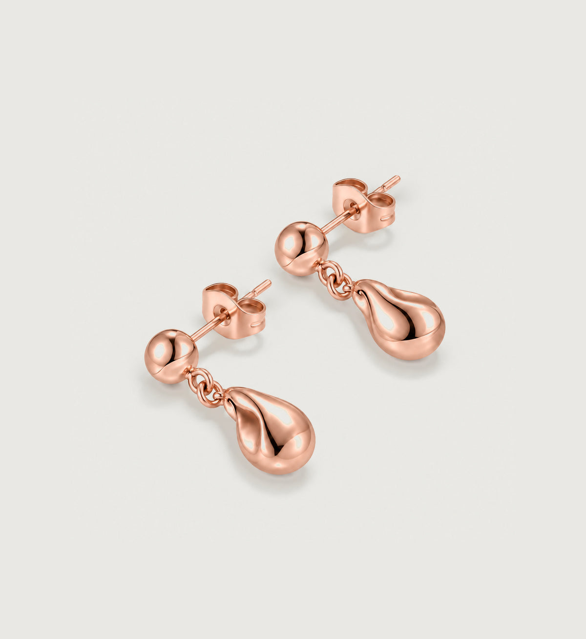 Neris Sculpted Teardrop Earrings (Rose Gold), angled product view