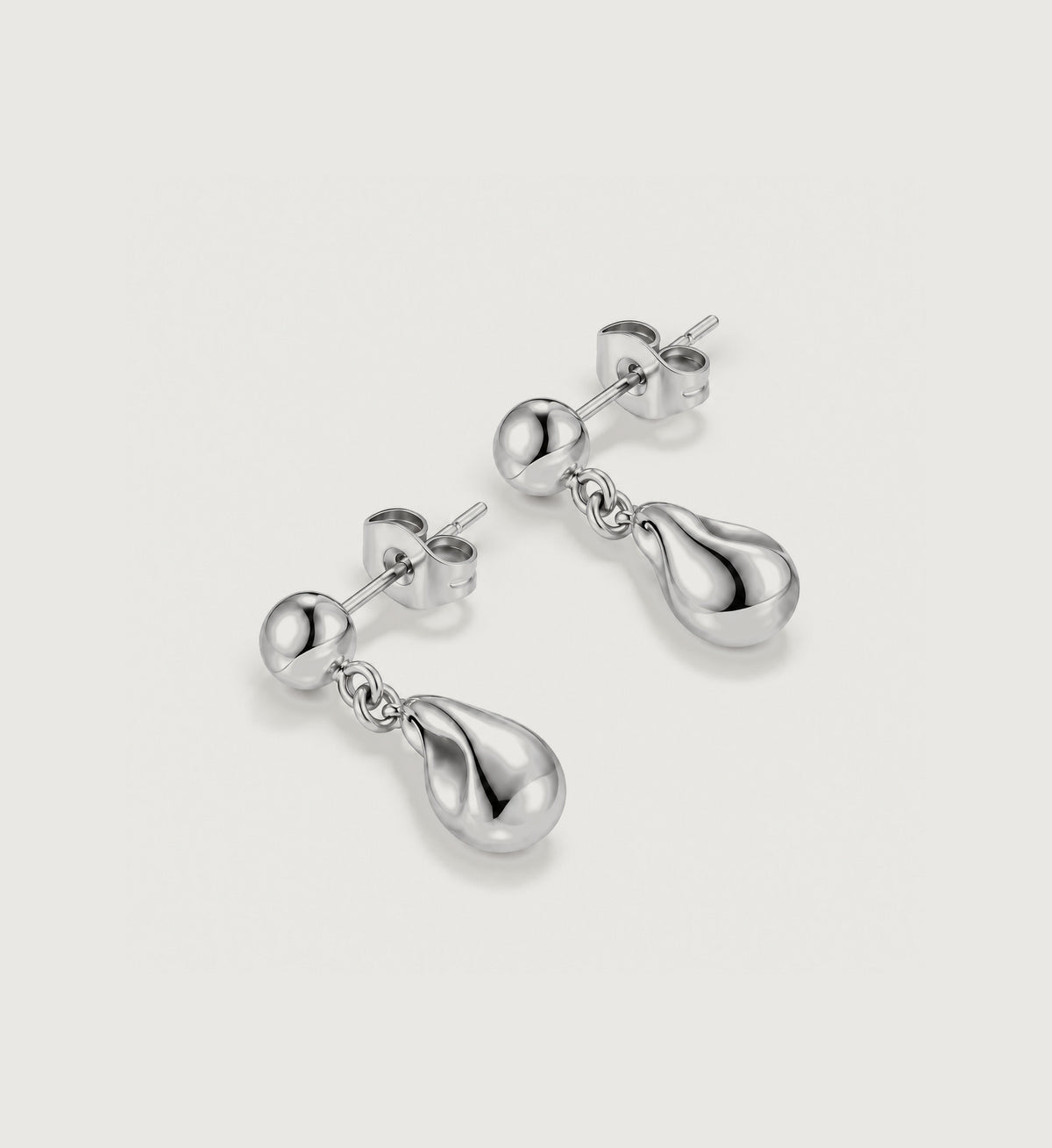 Neris Sculpted Teardrop Earrings (Silver), angled product view