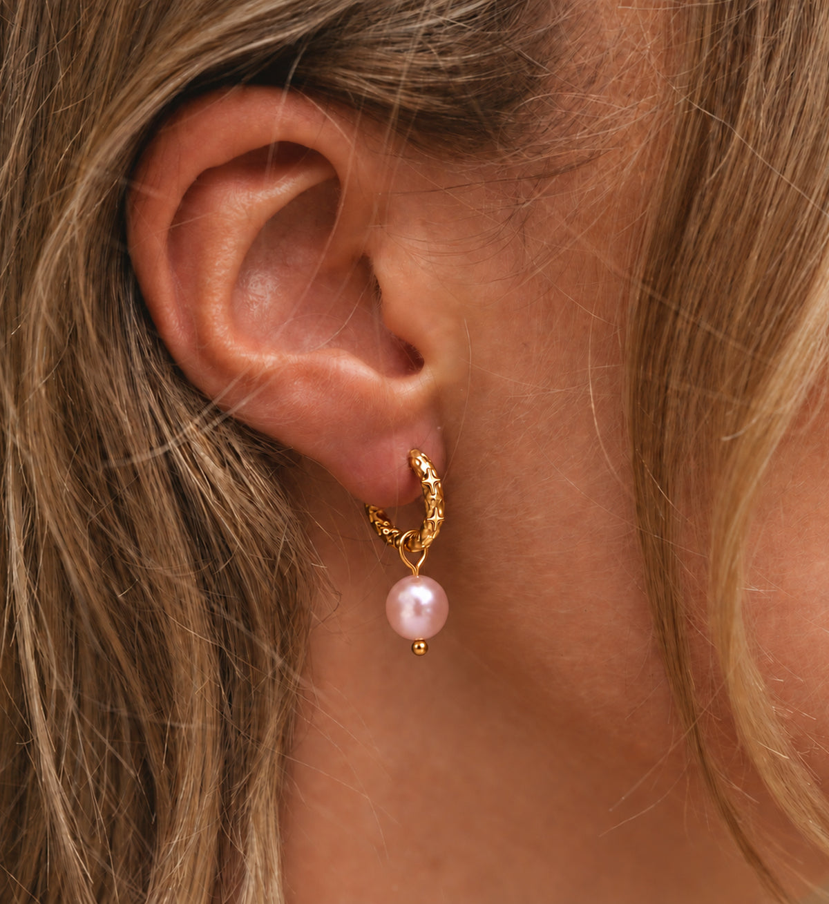 Noelle Pink Pearl Star Hoop Earrings in Gold, model styling view 1