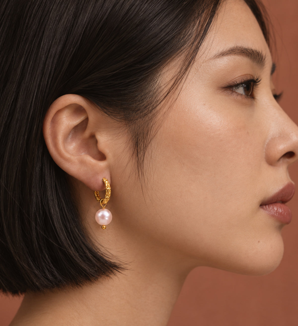 Noelle Pink Pearl Star Hoop Earrings in Gold, model styling view 6