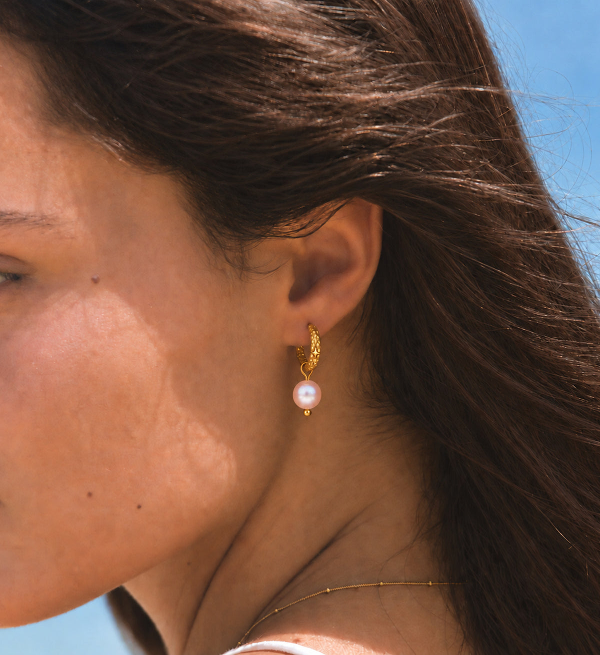 Noelle Pink Pearl Star Hoop Earrings in Gold, model styling view 8