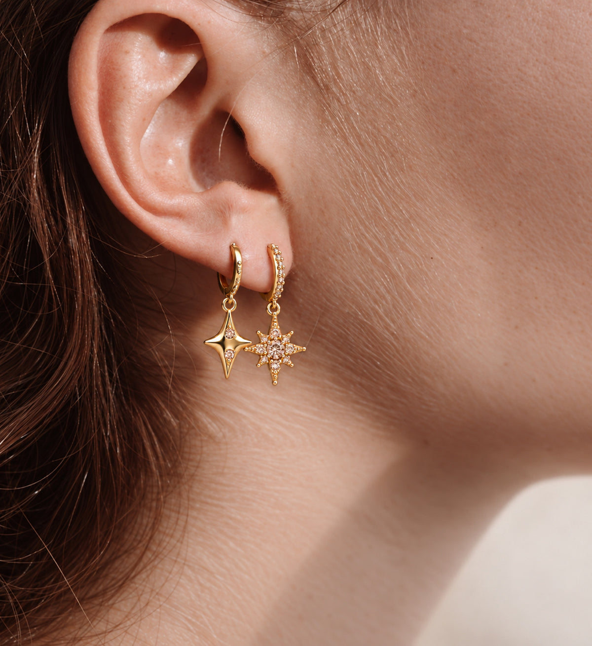 Nola Pave Star Drop Huggie Earrings in Gold, model styling view 1