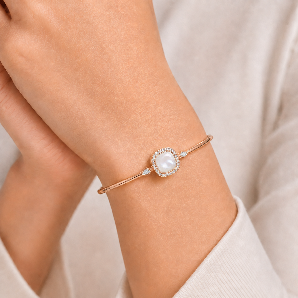 Relic Aura Bangle in pearl white styled on wrist
