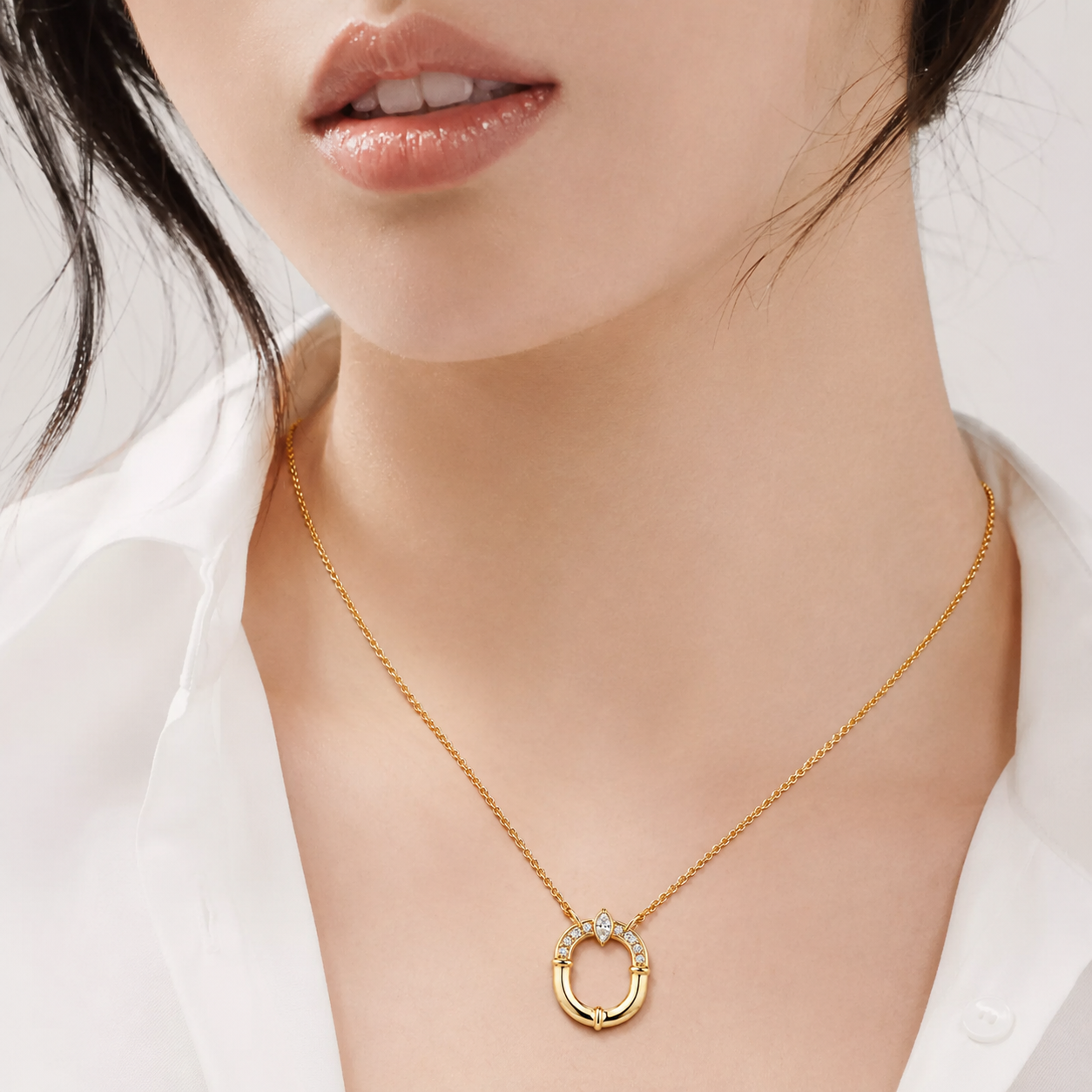 Relic Oval Halo Necklace in gold tone, model styling view