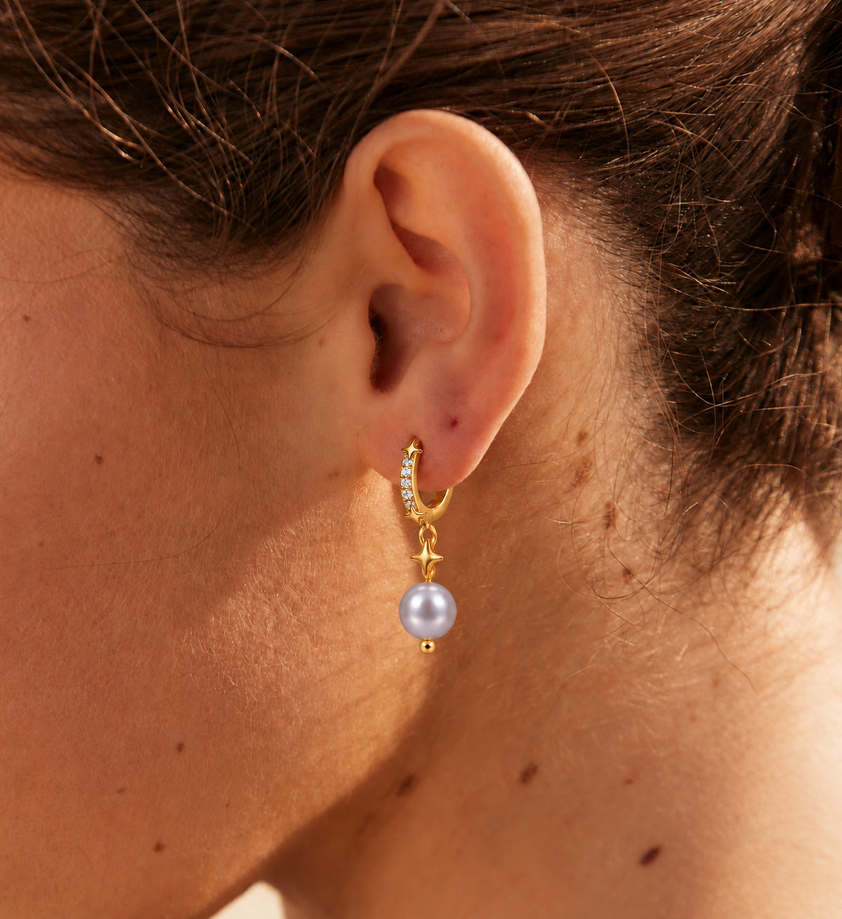 Seren Grey Pearl Star Hoop Earrings in Gold, model styling view 9